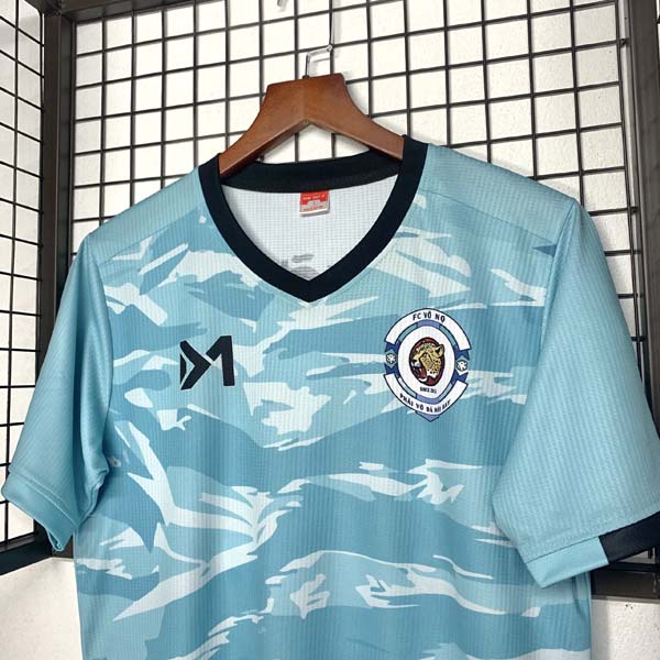 Thành phẩm sau may áo đấu màu xanh MC