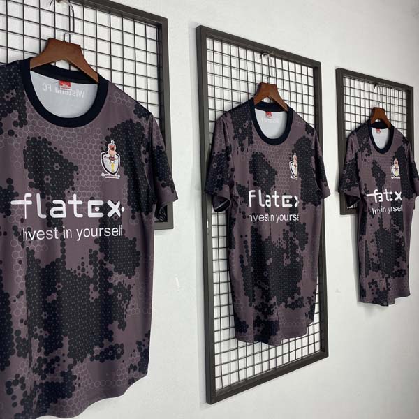 Áo đấu màu tím sau may tại Thiago